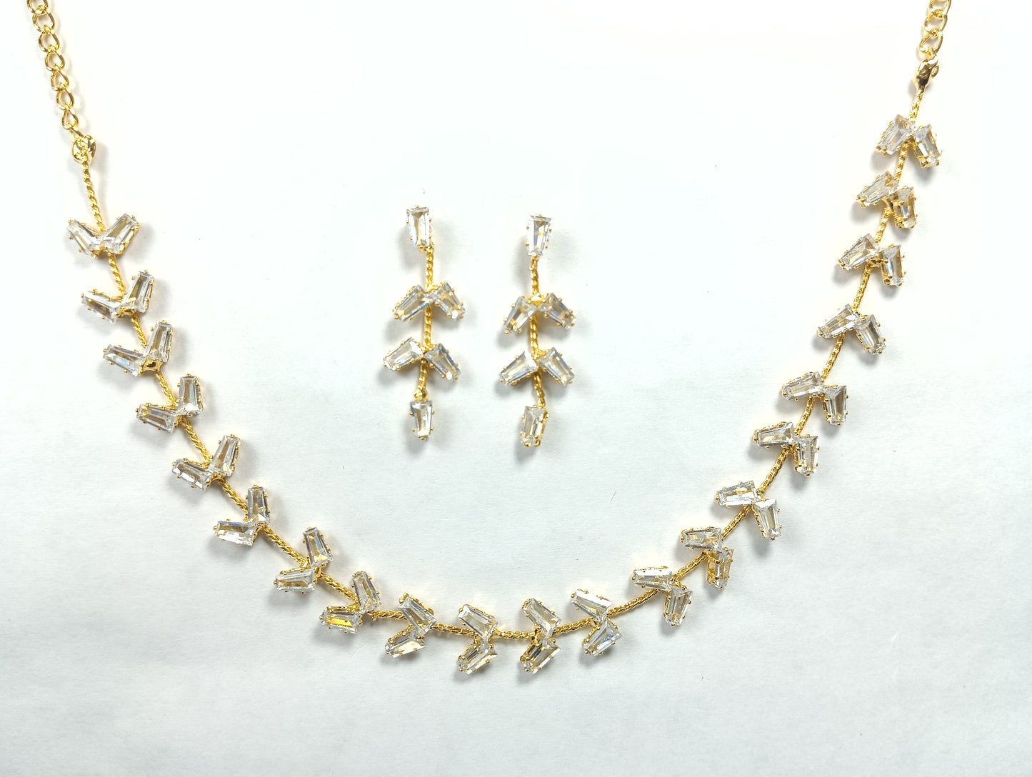 Gold-Plated Leafy Baguette Necklace Set – Modern Artificial CZ Jewellery with Earrings for Women